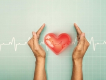hand hold 3d transparent heart shape with cardiogram, heart disease awareness campaign, cardiovascular health, stroke prevention, hypertension (high blood pressure) for heart disease concept